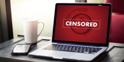 CENSORED Businessman at work. Close-up top view of man working CENSORED Businessman at work. Close-up top view of man working